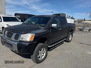 2004 Nissan Titan LE with VIN 1N6AA07A84N590583, listed as a Copart auction lot 49112705 with 92,426 mi miles and Salvage Title. Bid and sale history available at DreamBid. Image 2.