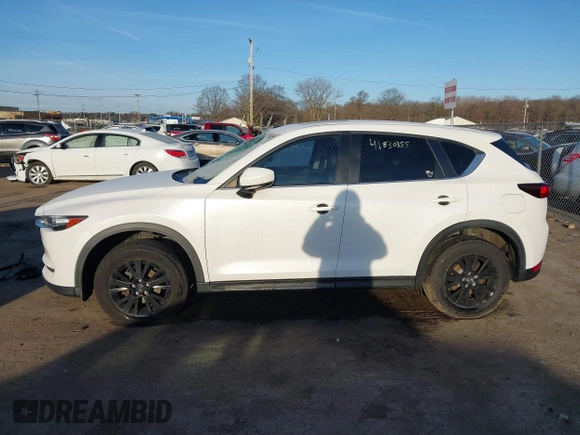 2017 Mazda CX-5 Touring with VIN JM3KFBCL8H0136601, listed as a IAAI auction lot 41830355 with 113,677 mi miles. Bid and sale history available at carsss.com. Image 15.