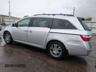 2012 Honda Odyssey EX-L with VIN 5FNRL5H68CB141022, listed as a Copart auction lot 54605485 with 185,388 mi miles and Salvage Title. Bid and sale history available at carsss.com. Image 2.