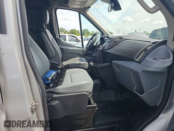 2017 Ford Transit Cargo z VIN 1FTYE1CMXHKA48291, wystawiony jako IAAI lot #42731289 z przebiegiem 142 973 mil mil oraz . Historia ofert i sprzedaży dostępna na DreamBid. Obrazek 2.