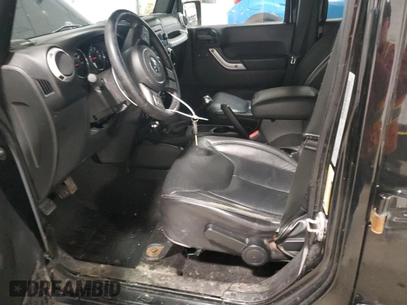 2015 Jeep Wrangler Unlimited Sahara with VIN 1C4BJWEG5FL611521, listed as a Copart auction lot 50609985 with 207,473 mi miles and Salvage Title. Bid and sale history available at carsss.com. Image 7.