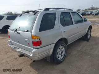 1998 Isuzu Rodeo S with VIN 4S2CM58W5W4350642, listed as a IAAI auction lot 41545706 with 1 mi miles. Bid and sale history available at carsss.com. Image 4.