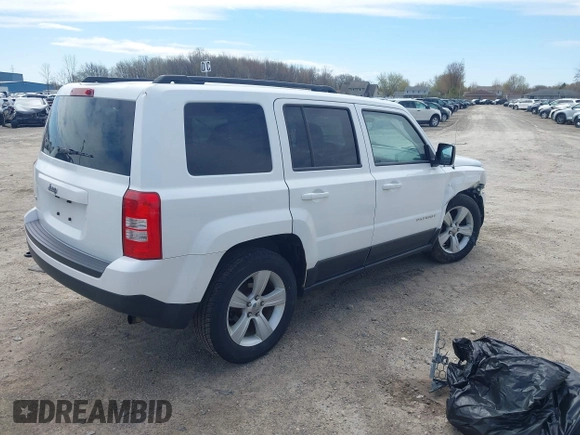 2014 Jeep Patriot Sport with VIN 1C4NJRBB5ED778512, listed as a IAAI auction lot 42172300 with 118,934 mi miles and . Bid and sale history available at carsss.com. Image 4.