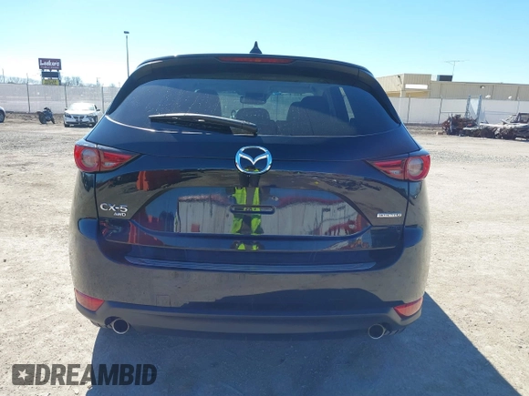 2020 Mazda CX-5 Grand Touring with VIN JM3KFBDMXL0763316, listed as a IAAI auction lot 41661958 with 64,881 mi miles and . Bid and sale history available at carsss.com. Image 17.