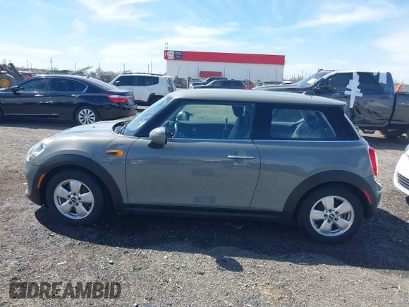 2019 MINI Hardtop Cooper with VIN WMWXP5C55K2H29830, listed as a IAAI auction lot 41808669 with 60,588 mi miles and . Bid and sale history available at DreamBid. Image 14.