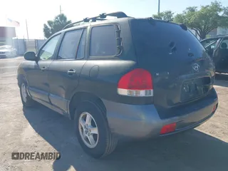 2006 Hyundai Santa Fe GLS with VIN KM8SC13D26U100098, listed as a IAAI auction lot 41985471 with 155,808 mi miles and . Bid and sale history available at DreamBid. Image 3.