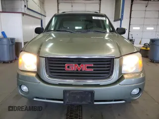 2004 GMC Envoy SLE with VIN 1GKDS13S442417232, listed as a Copart auction lot 51821225 with 242,945 mi miles and Salvage Title. Bid and sale history available at carsss.com. Image 5.