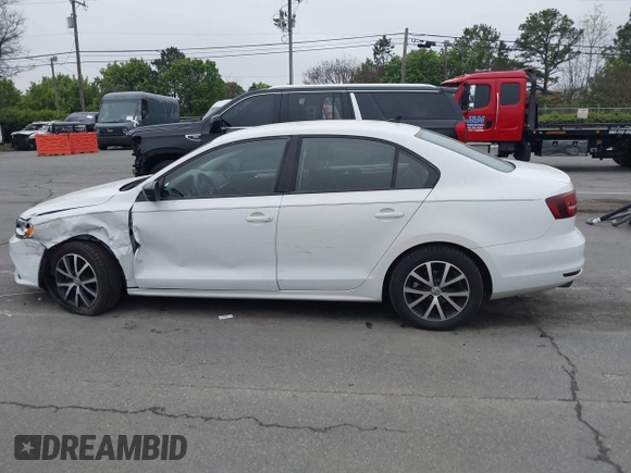 2016 Volkswagen Jetta Sedan 1.4T SE with VIN 3VWD67AJ6GM260584, listed as a IAAI auction lot 41903048 with 104,876 mi miles. Bid and sale history available at carsss.com. Image 14.
