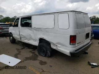 1998 Ford Econoline Wagon XL z VIN 1FBSS31L7WHA78125, wystawiony jako Copart lot #67549134 z przebiegiem 189 609 mil mil oraz Szkody całkowita. Historia ofert i sprzedaży dostępna na DreamBid. Obrazek 2.