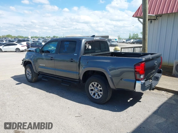 2018 Toyota Tacoma SR5 with VIN 3TMAZ5CN9JM070187, listed as a IAAI auction lot 41816520 with 43,068 mi miles and . Bid and sale history available at DreamBid. Image 3.