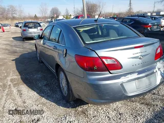 2009 Chrysler Sebring Touring *Ltd Avail* with VIN 1C3LC56BX9N521516, listed as a IAAI auction lot 41920006 with 114,912 mi miles. Bid and sale history available at carsss.com. Image 3.
