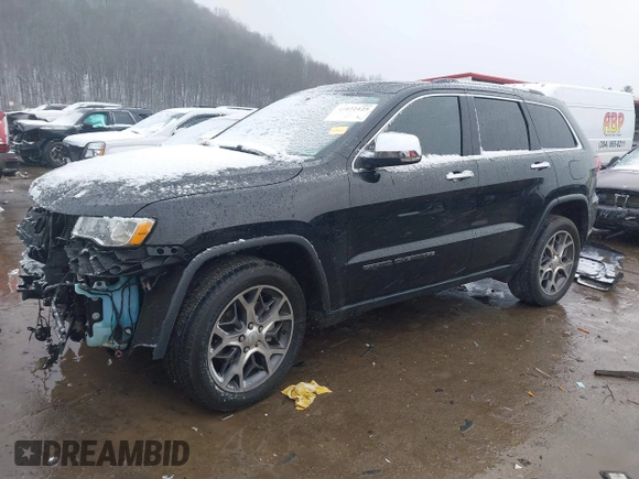 2021 Jeep Grand Cherokee 80th Anniversary with VIN 1C4RJFBG4MC510082, listed as a IAAI auction lot 41072125 with 55,610 mi miles and . Bid and sale history available at DreamBid. Image 18.