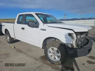 2015 Ford F-150 XLT with VIN 1FTFX1EFXFKD70393, listed as a Copart auction lot 51320365 with 173,741 mi miles and Salvage title. Bid and sale history available at DreamBid. Image 4.