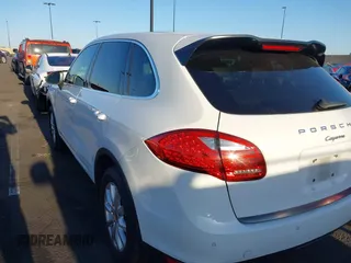2014 Porsche Cayenne with VIN WP1AA2A28ELA96123, listed as a IAAI auction lot 42010456 with 154,312 mi miles and . Bid and sale history available at DreamBid. Image 3.