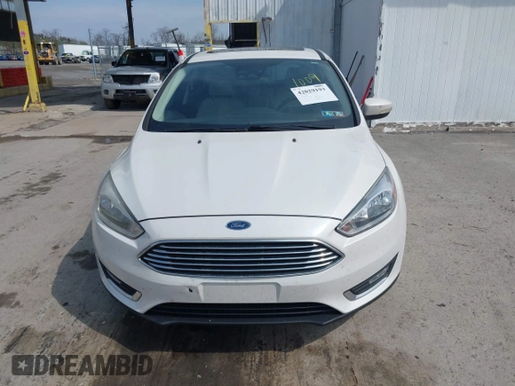 2017 Ford Focus Titanium with VIN 1FADP3N24HL331009, listed as a IAAI auction lot 42029193 with 82,068 mi miles and . Bid and sale history available at carsss.com. Image 12.