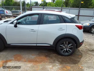 2017 Mazda CX-3 Grand Touring with VIN JM1DKFD78H0160564, listed as a IAAI auction lot 39236942 with 50,921 mi miles. Bid and sale history available at carsss.com. Image 14.