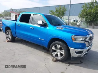 2022 Ram 1500 Laramie with VIN 1C6SRFJT0NN352135, listed as a IAAI auction lot 42168467 with 58,800 mi miles and . Bid and sale history available at DreamBid. Image 1.