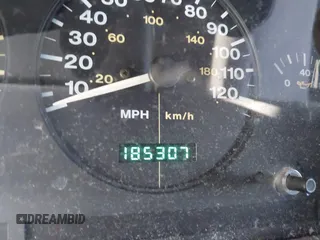 1997 Jeep Grand Cherokee Laredo with VIN 1J4GZ58S0VC550242, listed as a IAAI auction lot 41032114 with 185,307 mi miles. Bid and sale history available at carsss.com. Image 15.