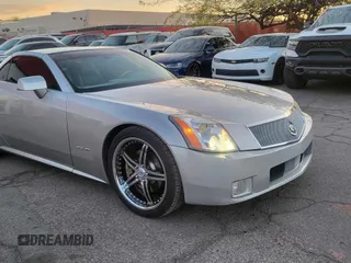 2004 Cadillac XLR z VIN 1G6YV34A945601816, wystawiony jako Copart lot #48981505 z przebiegiem 182 078 mil mil oraz Tytuł czysty. Historia ofert i sprzedaży dostępna na DreamBid. Obrazek 1.