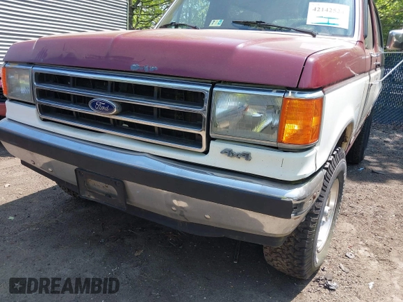 1989 Ford Bronco XL with VIN 1FMEU15N8KLB48656, listed as a IAAI auction lot 42142524 with 87,459 mi miles. Bid and sale history available at carsss.com. Image 6.