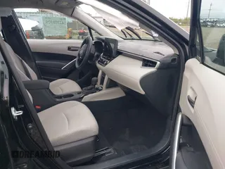 2023 Toyota Corolla Cross L with VIN 7MUAAABG3PV049367, listed as a IAAI auction lot 42370328 with 15,207 mi miles and . Bid and sale history available at DreamBid. Image 5.