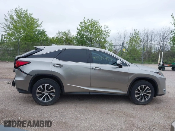 2022 Lexus RX 350 with VIN 2T2AZMDA7NC352957, listed as a IAAI auction lot 42297457 with 34,576 mi miles and . Bid and sale history available at DreamBid. Image 13.