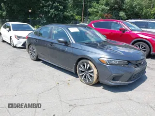 2023 Honda Civic EX with VIN 2HGFE1F75PH302414, listed as a IAAI auction lot 42680807 with 49,520 mi miles and . Bid and sale history available at DreamBid. Image 1.
