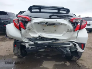 2020 Toyota C-HR LE with VIN JTNKHMBX9L1092934, listed as a IAAI auction lot 42021972 with 56,777 mi miles and . Bid and sale history available at DreamBid. Image 6.