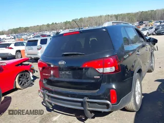 2014 Kia Sorento LX with VIN 5XYKTCA66EG483726, listed as a IAAI auction lot 41829970 with 102,294 mi miles and . Bid and sale history available at carsss.com. Image 4.