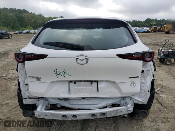 2021 Mazda CX-30 S with VIN 3MVDMBAL4MM219507, listed as a Copart auction lot 55579865 with 53,707 mi miles and Salvage title. Bid and sale history available at DreamBid. Image 6.