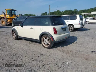 2006 MINI Hardtop with VIN WMWRC33506TK18077, listed as a IAAI auction lot 42583190 with 170,819 mi miles and . Bid and sale history available at DreamBid. Image 3.