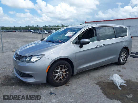 2017 Chrysler Pacifica Touring with VIN 2C4RC1DG7HR516711, listed as a IAAI auction lot 42633544 with 97,853 mi miles and . Bid and sale history available at DreamBid. Image 2.