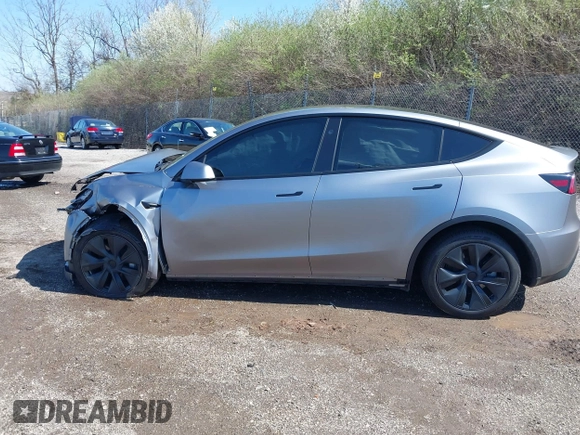 2024 Tesla Model Y Long Range with VIN 7SAYGDEE2RA311261, listed as a IAAI auction lot 41534010 with Not Provided miles and . Bid and sale history available at DreamBid. Image 15.