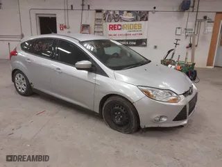 2012 Ford Focus SE with VIN 1FAHP3K26CL432308, listed as a IAAI auction lot 41854113 with 153,094 mi miles. Bid and sale history available at carsss.com. Image 1.