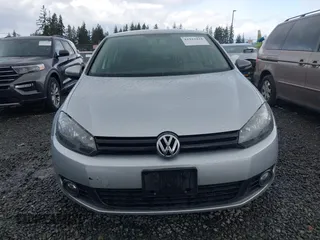 2013 Volkswagen Golf TDI z VIN WVWDM7AJ5DW083014, wystawiony jako IAAI lot #41923434 z przebiegiem 180 288 mil mil oraz . Historia ofert i sprzedaży dostępna na DreamBid. Obrazek 13.