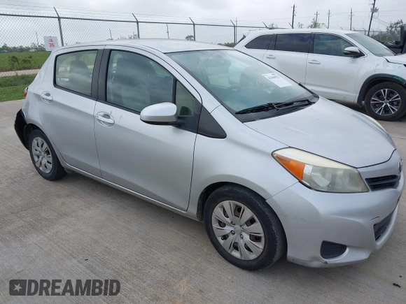 2013 Toyota Yaris L with VIN JTDKTUD32DD542761, listed as a IAAI auction lot 41969533 with 123,281 mi miles. Bid and sale history available at carsss.com. Image 1.