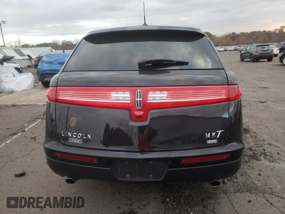 2019 Lincoln MKT with VIN 2LMHJ5NK3KBL04254, listed as a Copart auction lot 77127214 with Not Provided miles and Salvage Title. Bid and sale history available at DreamBid. Image 6.