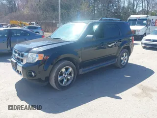 2012 Ford Escape Limited with VIN 1FMCU9EG1CKA40720, listed as a IAAI auction lot 42142713 with 127,658 mi miles. Bid and sale history available at carsss.com. Image 2.