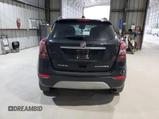 2018 Buick Encore Preferred with VIN KL4CJASB2JB665917, listed as a Copart auction lot 52952515 with 93,036 mi miles and Salvage Title. Bid and sale history available at DreamBid. Image 6.