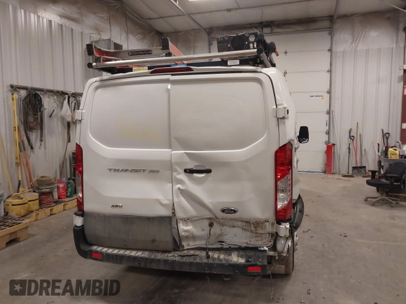 2022 Ford Transit with VIN 1FTBW2Y86NKA06331, listed as a IAAI auction lot 41842602 with 32,869 mi miles and . Bid and sale history available at DreamBid. Image 16.