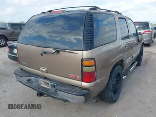 2004 GMC Yukon SLT with VIN 1GKEC13V54J218787, listed as a IAAI auction lot 42047107 with 1 mi miles. Bid and sale history available at carsss.com. Image 4.