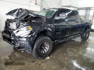 2021 Ram 2500 Laramie with VIN 3C6UR5NL8MG502996, listed as a Copart auction lot 87127824 with 63,840 mi miles and Salvage Title. Bid and sale history available at carsss.com. Image 1.