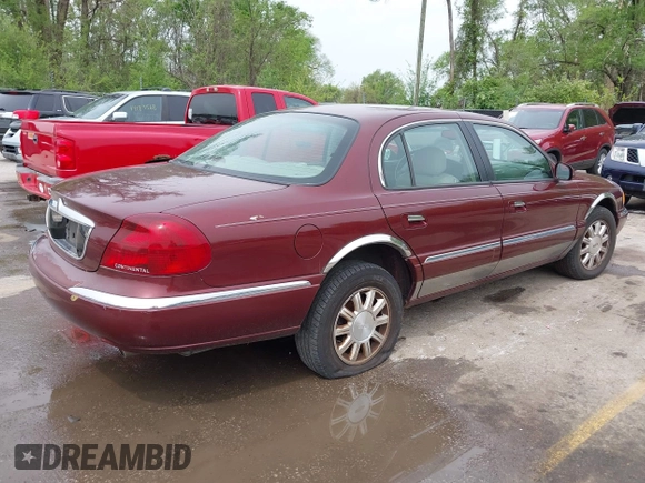 2000 Lincoln Continental with VIN 1LNHM97V5YY845447, listed as a IAAI auction lot 42077417 with 83,655 mi miles. Bid and sale history available at carsss.com. Image 4.