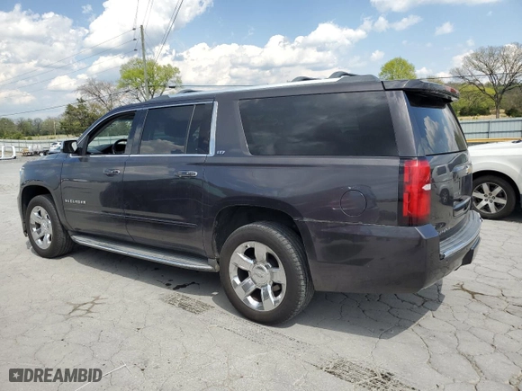 2015 Chevrolet Suburban LTZ with VIN 1GNSCKKCXFR216890, listed as a Copart auction lot 52695155 with 233,296 mi miles and Clean Title. Bid and sale history available at carsss.com. Image 2.