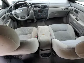 2000 Ford Taurus SE z VIN 1FAFP53U5YA259273, wystawiony jako Copart lot #52787305 z przebiegiem 234 848 mil mil oraz Szkoda całkowita • Salvage title. Historia ofert i sprzedaży dostępna na DreamBid. Obrazek 8.