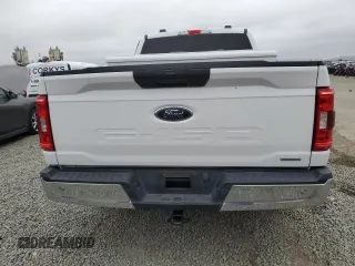 2021 Ford F-150 XL z VIN 1FTEW1CP5MKD10061, wystawiony jako Copart lot #50598155 z przebiegiem 70 055 mil mil oraz Szkoda całkowita • Salvage title. Historia ofert i sprzedaży dostępna na DreamBid. Obrazek 6.