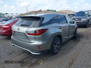 2020 Lexus RX 350L with VIN JTJHZKFA7L2024953, listed as a IAAI auction lot 42655825 with 63,827 mi miles and . Bid and sale history available at DreamBid. Image 4.