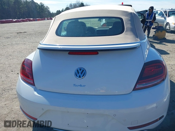 2018 Volkswagen Beetle S with VIN 3VW5DAAT1JM506988, listed as a IAAI auction lot 41589324 with 50,873 mi miles and . Bid and sale history available at DreamBid. Image 17.