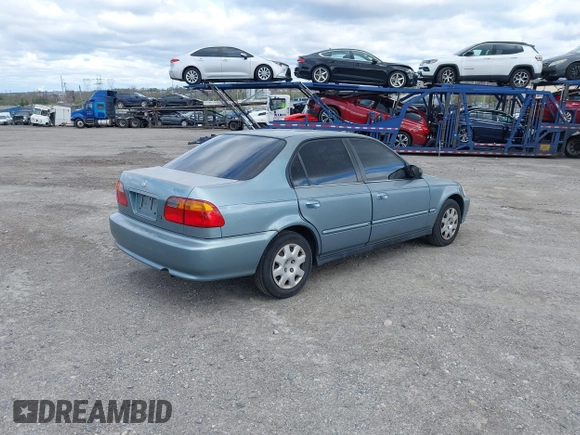 2000 Honda Civic VP with VIN 2HGEJ6614YH547366, listed as a IAAI auction lot 42059413 with 139,669 mi miles. Bid and sale history available at carsss.com. Image 4.