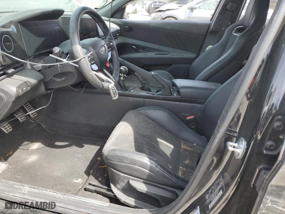 2023 Hyundai Elantra N with VIN KMHLW4AK9PU014867, listed as a Copart auction lot 49674295 with 46,886 mi miles and Salvage Title. Bid and sale history available at carsss.com. Image 7.